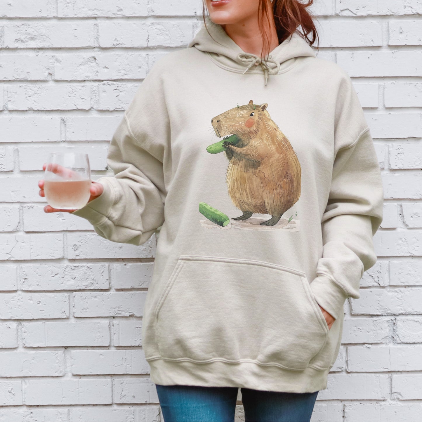 Capybara Eating Cucumber Unisex Hoodie – Cozy & Playful Sweatshirt