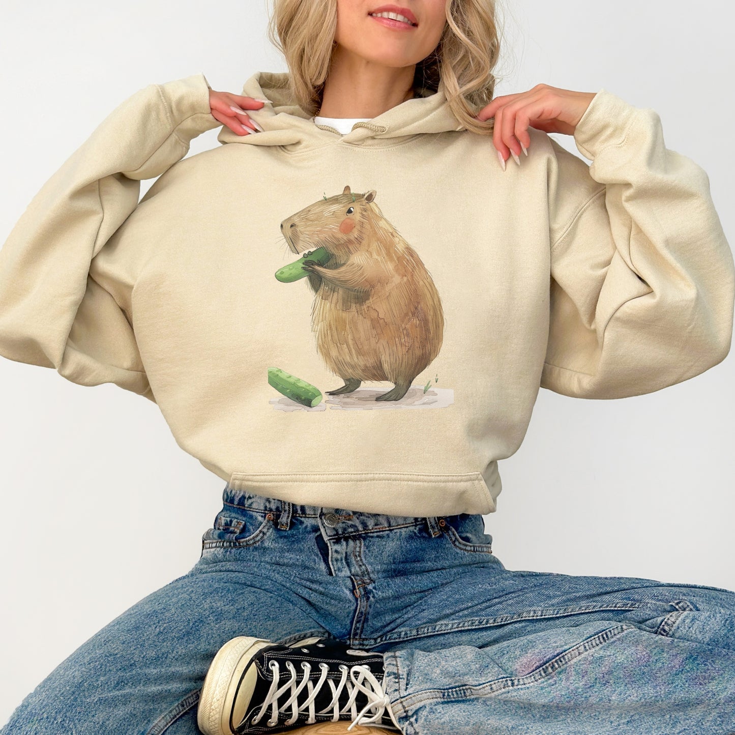 Capybara Eating Cucumber Unisex Hoodie – Cozy & Playful Sweatshirt