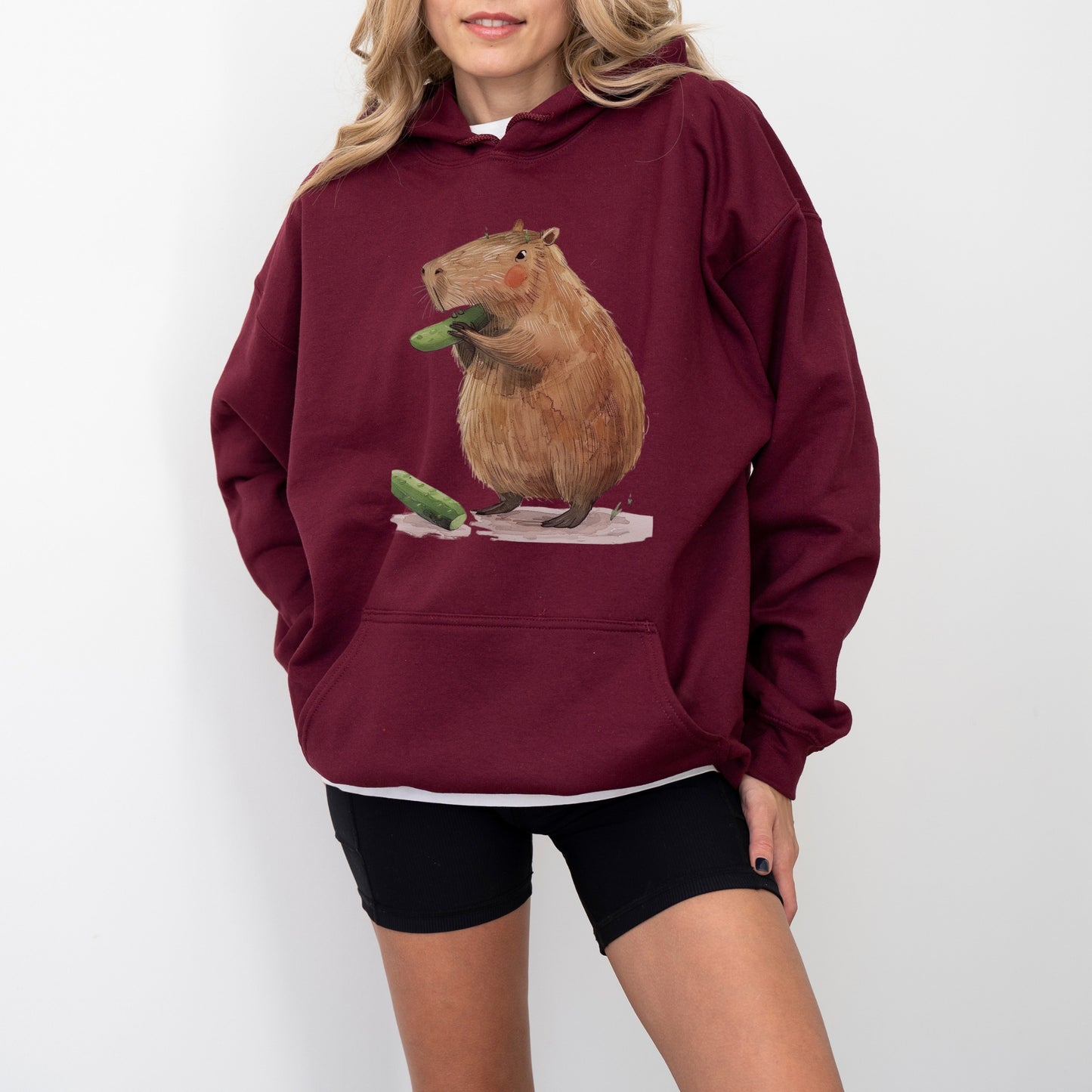 Capybara Eating Cucumber Unisex Hoodie – Cozy & Playful Sweatshirt