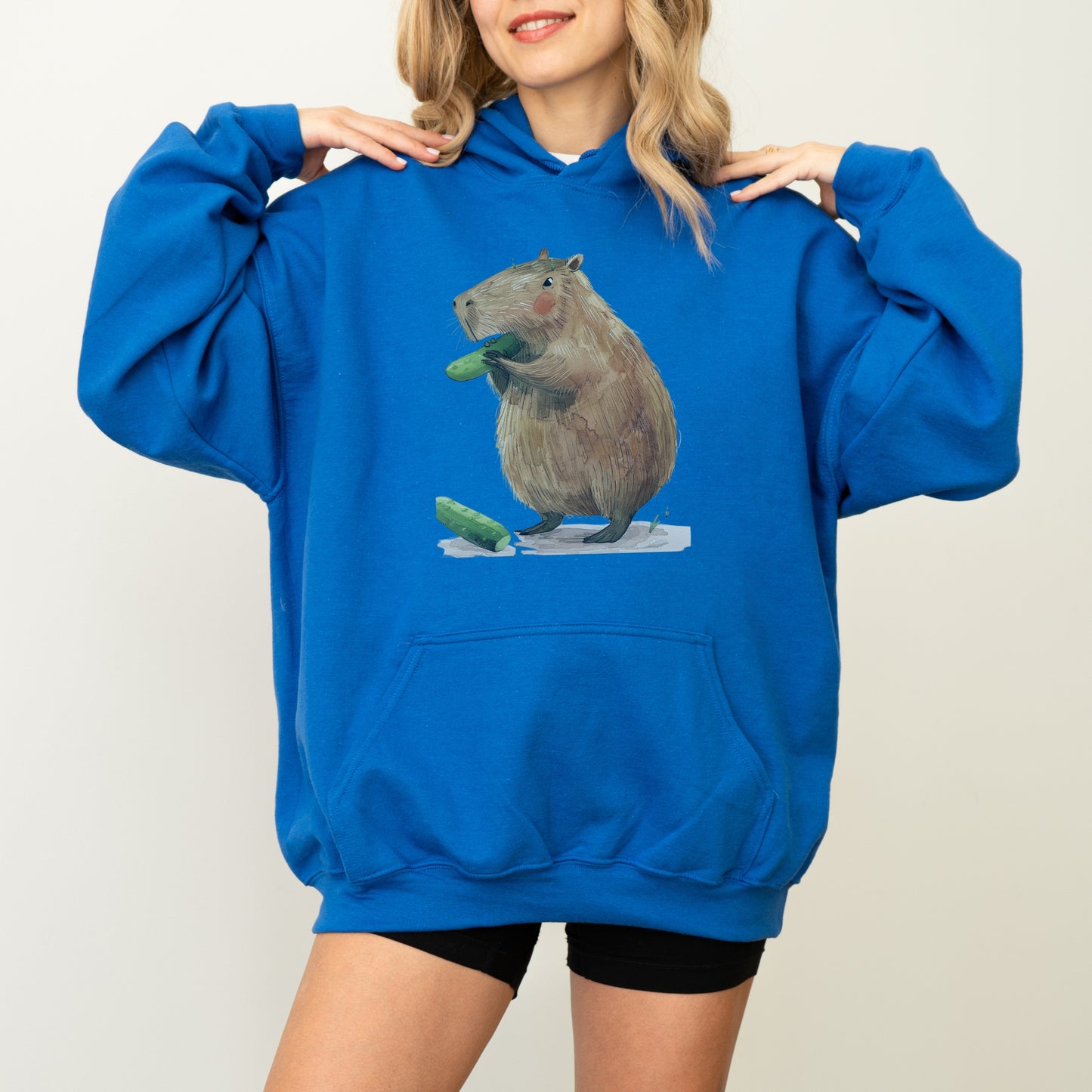 Capybara Eating Cucumber Unisex Hoodie – Cozy & Playful Sweatshirt