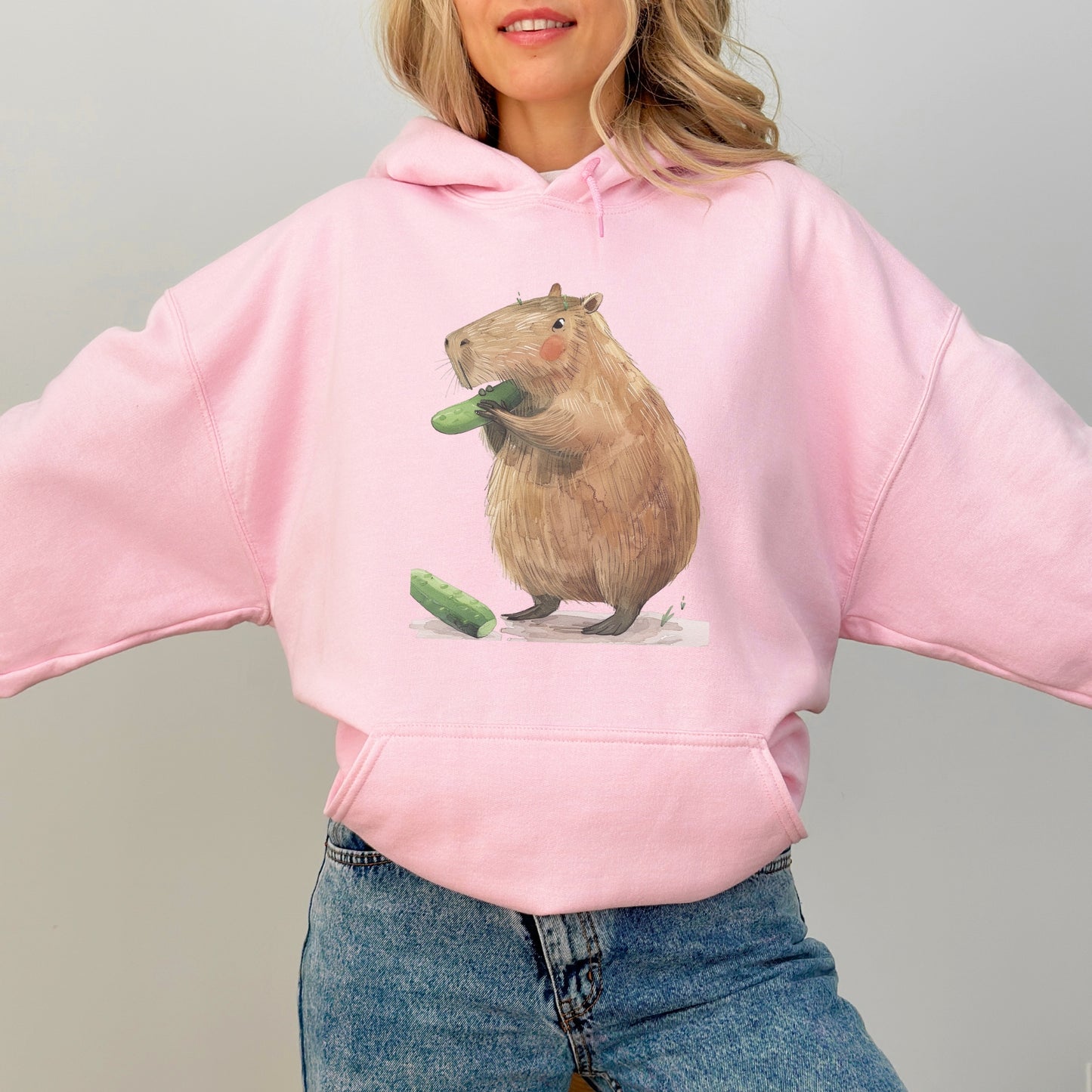 Capybara Eating Cucumber Unisex Hoodie – Cozy & Playful Sweatshirt