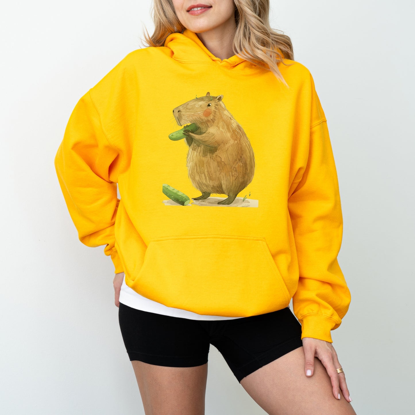 Capybara Eating Cucumber Unisex Hoodie – Cozy & Playful Sweatshirt